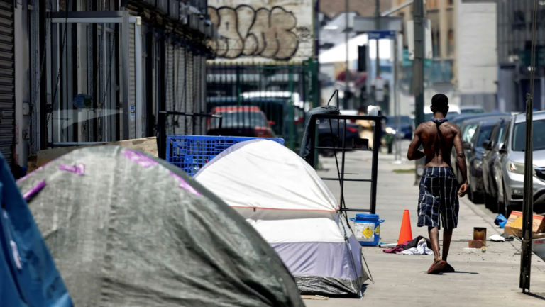 tents on sidewalk|