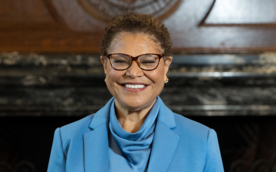 woman in glasses and blue suit