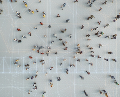 Abstract crowds of people with virtual reality street display.