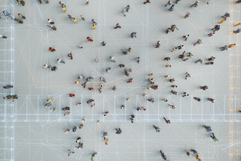 Abstract crowds of people with virtual reality street display.