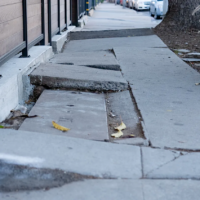 sidewalk with cracked concrete