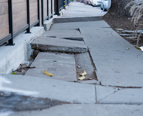 sidewalk with cracked concrete