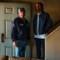 LeapLAPD Photo of LAPD Senior Lead Officer John Coughlin with Tionne Tisdale.