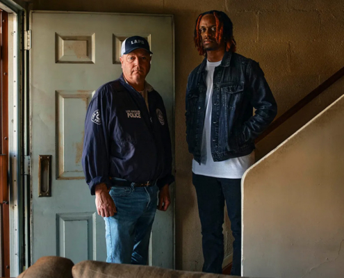 Photo of LAPD Senior Lead Officer John Coughlin with Tionne Tisdale.
