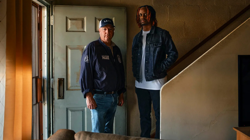 Photo of LAPD Senior Lead Officer John Coughlin with Tionne Tisdale.