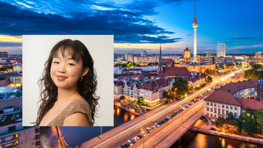headshot of student Fiona Lu over cityscape photo of Berlin