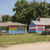 CNN hostile architecture Two houses painted in rainbow colors