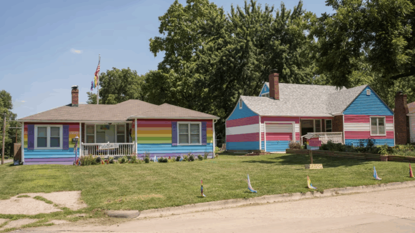 Two houses painted in rainbow colors