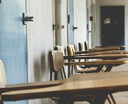school desks in classroom