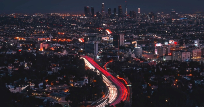Aerial view of LA skyline and congested freeways at night