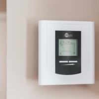 Thermostat on the wall.