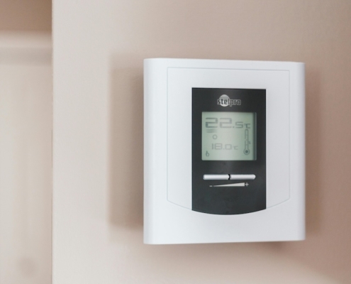Thermostat on the wall.
