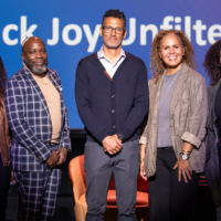 Panelists from the Luskin Lecture on February 25 at the UCLA Nimoy Theater with Michael Harriot, Michael Lens, and Safiya Noble stand on center stage to pose for a group photo.