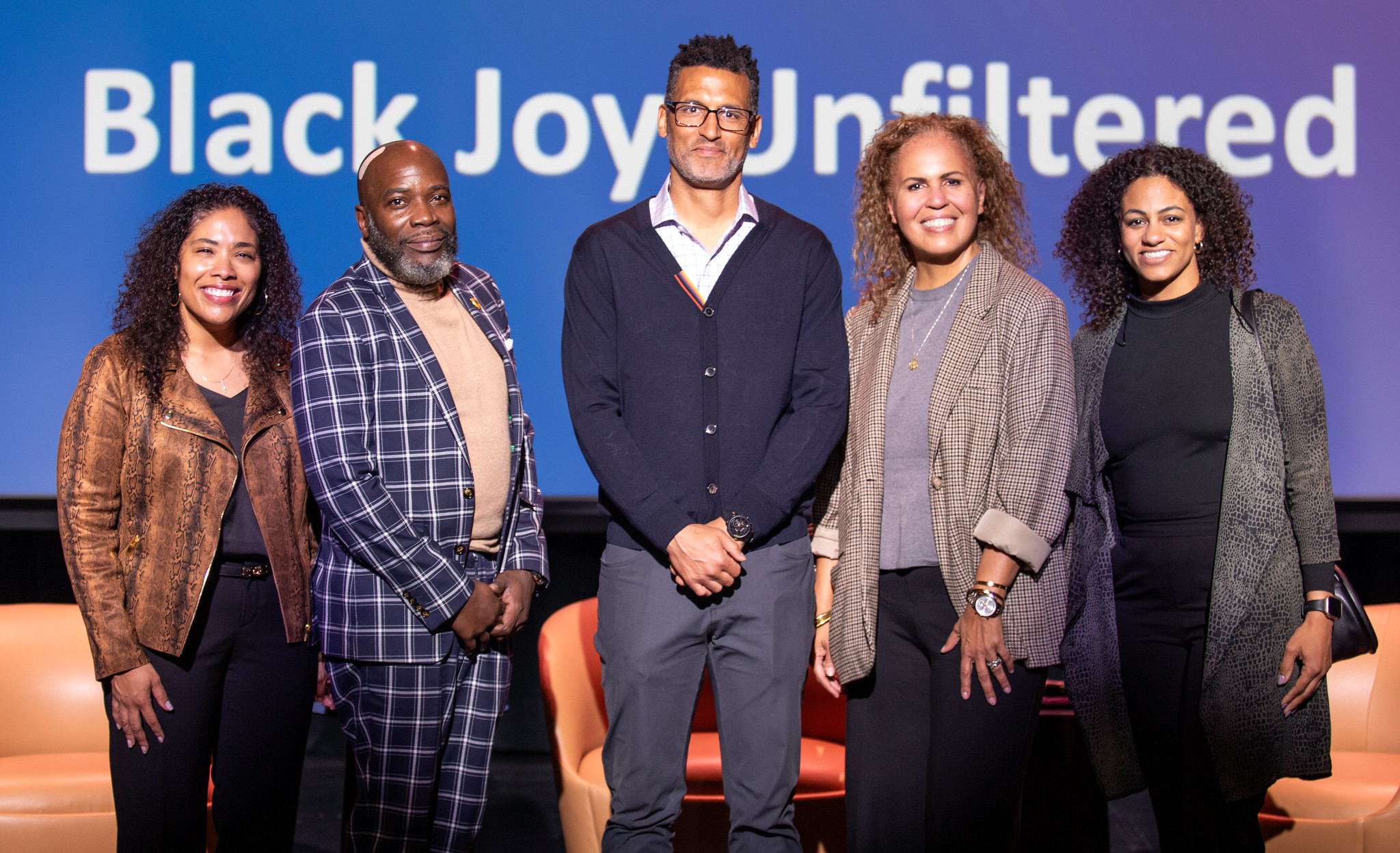 Panelists from the Luskin Lecture on February 25 at the UCLA Nimoy Theater with Michael Harriot, Michael Lens, and Safiya Noble stand on center stage to pose for a group photo.