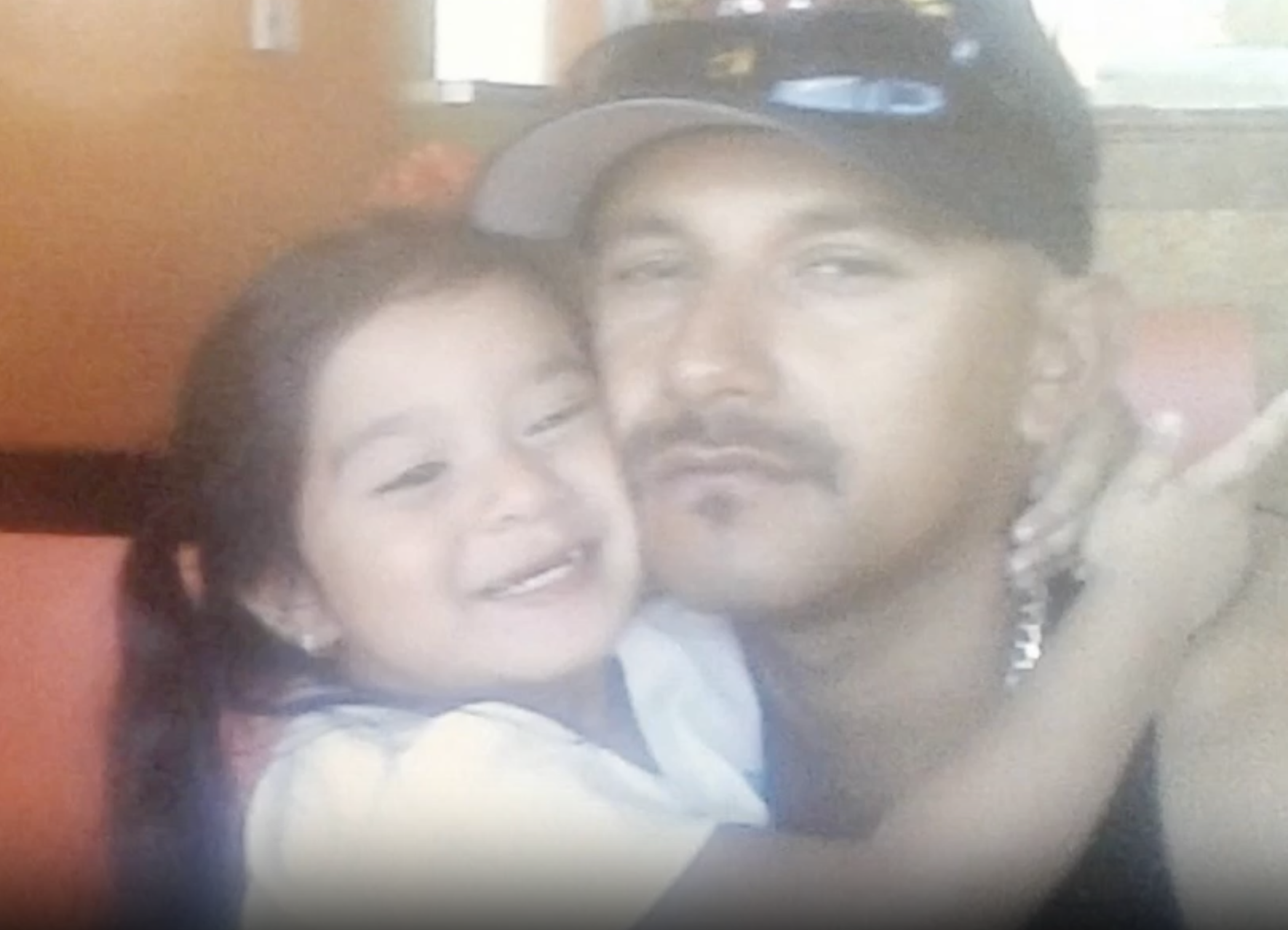 Old family photo of UCLA student Cianna and her father Cesar Ulloa former gang-member. They both went through programs at Homeboy Industries.