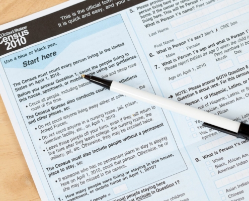 US, Census form document with pen on top