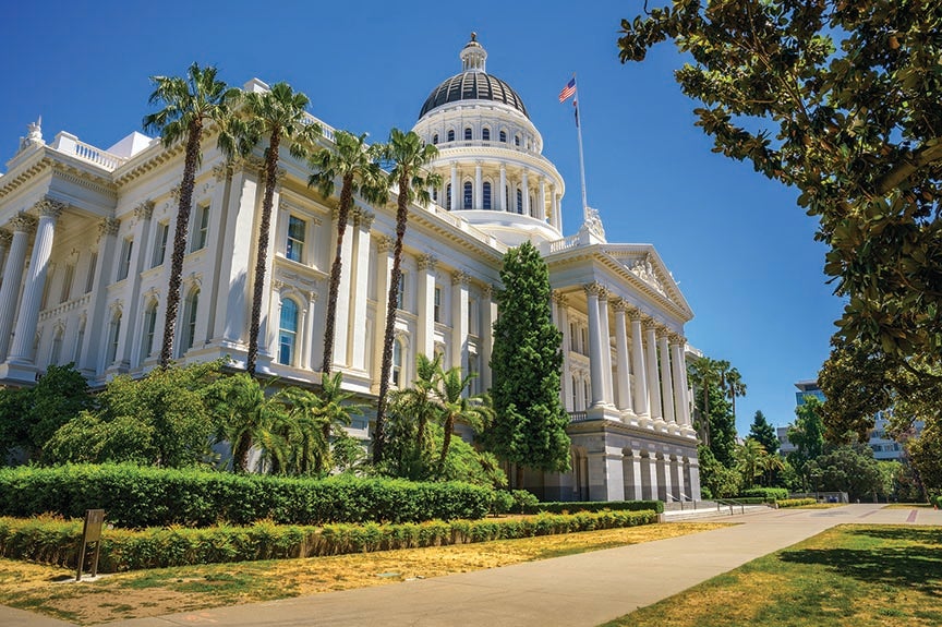 California State Capitol building on a sunny day in Sacramento. The California State Capitol stands as a historic edifice, combining neoclassical architecture with the functions of state government.