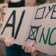 protest signs in opposition to artificial intelligence