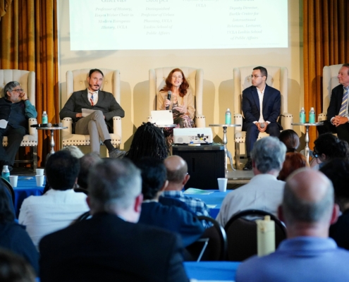 5 panelists sit on stage in the UCLA Kerckhoff Grand Salon for the 2026 Berggruen Governance Index "Four Worlds of Governance" event on May 6.