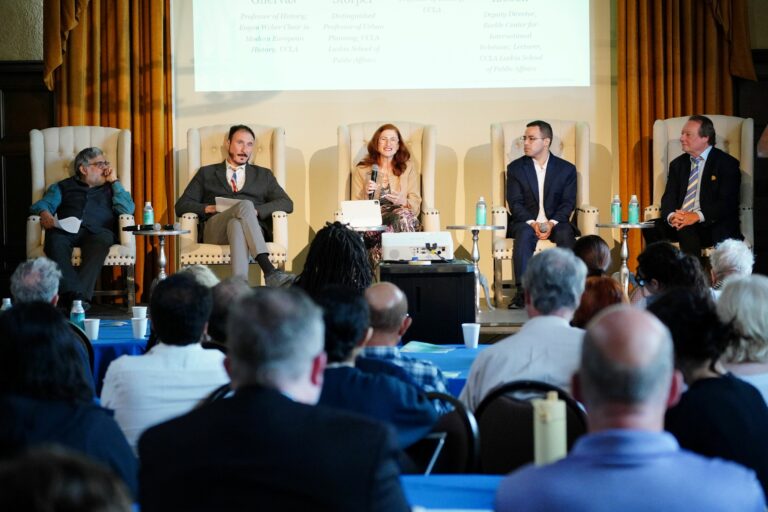 5 panelists sit on stage in the UCLA Kerckhoff Grand Salon for the 2026 Berggruen Governance Index "Four Worlds of Governance" event on May 6