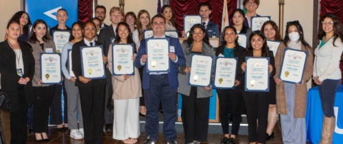 Luskin Students stand together for a group photo with their certificate of awards on the annual Luskin City Hall Day 2026.