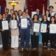 Luskin Students stand together for a group photo with their certificate of awards on the annual Luskin City Hall Day 2026.