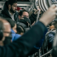 People taking the subway.