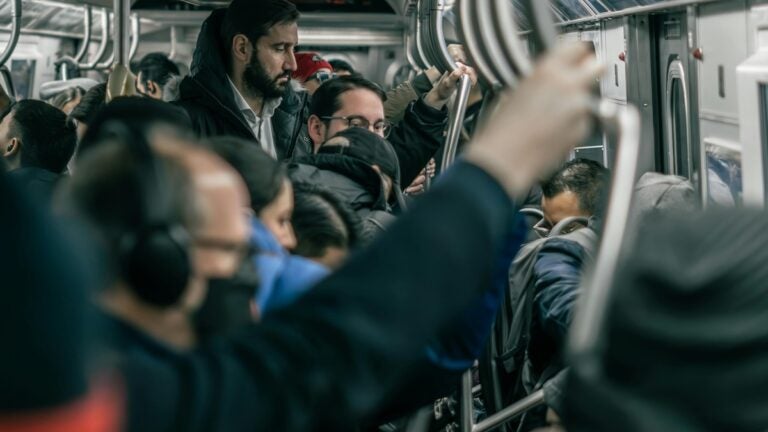 People taking the subway.