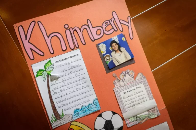 Twelve-year-old Khimberly Zavaleta Chuquipa died after an alleged bullying incident at her school. (Jason Armond / Los Angeles Times)|Person hugging their knees.|
