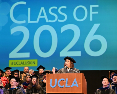 Caroline Menjivar speaks on stage at UCLA Luskin Commencement ceremonies on June 12, 2026. She is a California State Senator and a prominent alumna of the UCLA Luskin School of Public Affairs, having earned her Master of Social Welfare (MSW) in 2018.
