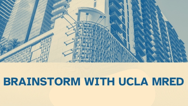 Canva image with blue and sandy colors showing the corner of a skyscraper.