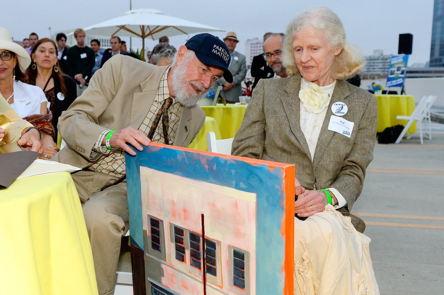 Man and woman with painting