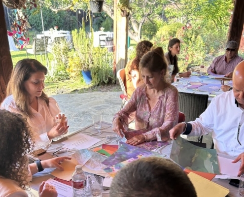 IMG_5954 Astor-Amal_handmade midrash Group works on art project on outdoor patio