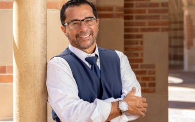 Headshot of Paco Retana ʼ87, M.S.W. ʼ90 who is the social welfare alumnus of the year 2025.