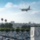 LAX airport with airplane about to land at the airport.