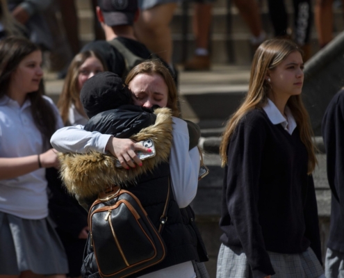 female students hug