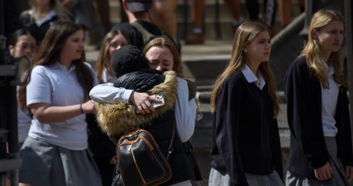 female students hug
