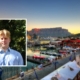 Cooper Emmott headshot over a landscape shot of Cape Town South Africa.