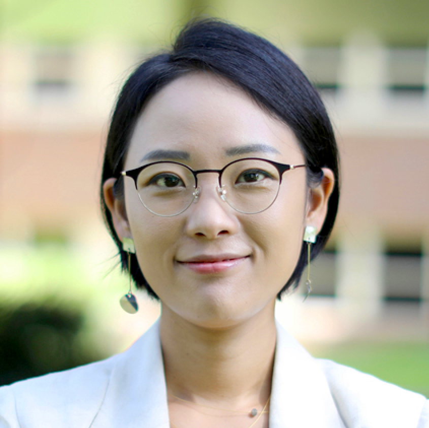 Headshot of person with glasses