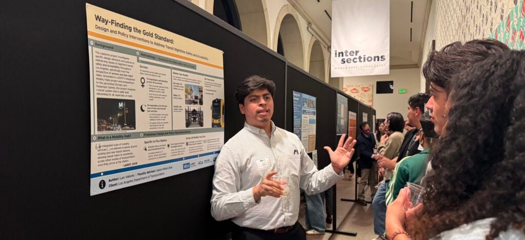 Urban Planning student Luis gives presentation at Triple C event for capstone project.