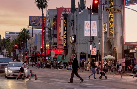 people cross a street in Hollywood
