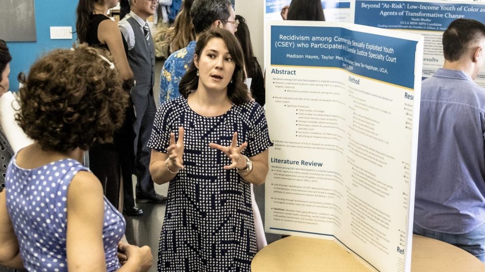Madison Hayes presents research into sexually exploited youth, completed as part of Social Welfare's capstone requirement. Photo by Les Dunseith