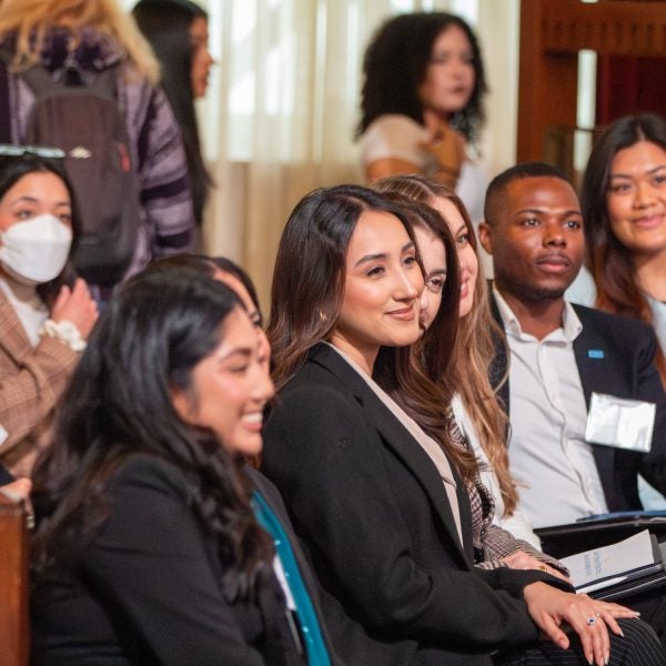 Students in Los Angeles City Hall listening to a presentation
