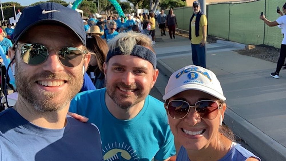 First-year MSW students Patrick McCormick, left, and Syd Peterson join field faculty member Laura Alongi Brinderson at the Alive & Running 5K.