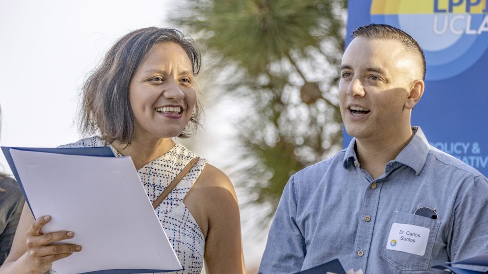 Among the nine new faculty members at UCLA Luskin are Amada Armenta and Carlos Santos. Photo by Les Dunseith