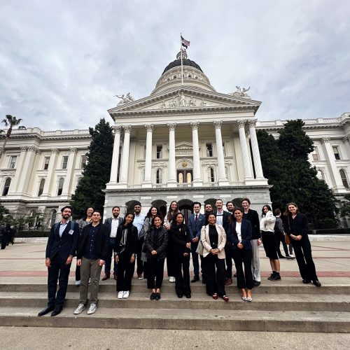 Group of college students in front of the California State Capitol Building