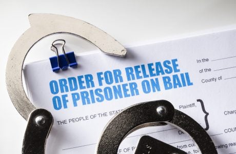 According to the study, disproportionately bearing the burden of the actual dollars paid for bail bonds were women, “namely black women and Latinas." iStock/Bill Oxford