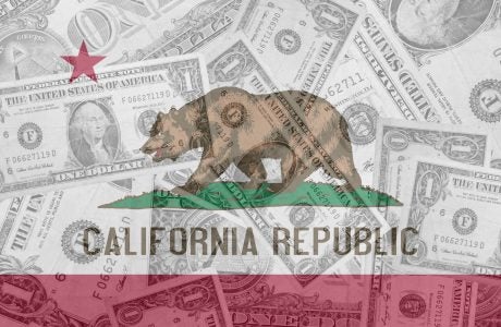California flag with bear and star, overlaid against dollar bills