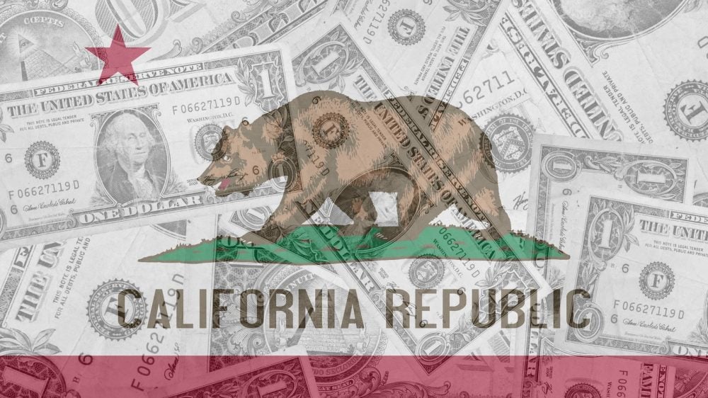 California flag with bear and star, overlaid against dollar bills