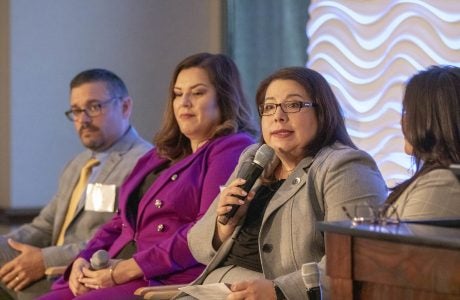 Erica Bernal-Martinez of National Association of Latino Elected Officials (NALEO) Educational Fund speaks as other panelists listen. Photos by Stan Paul